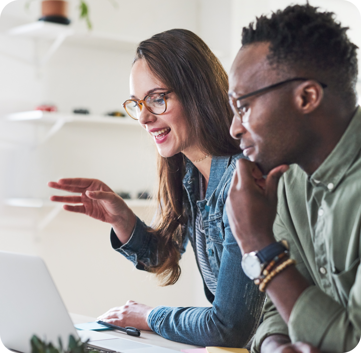 Man and woman looking at laptop